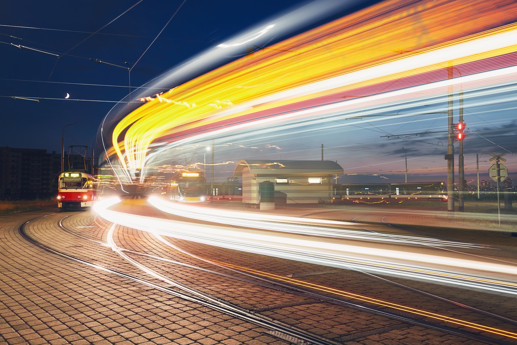 Public transportation at night. Lights of the tram in motion. Prague, Czech Republic
